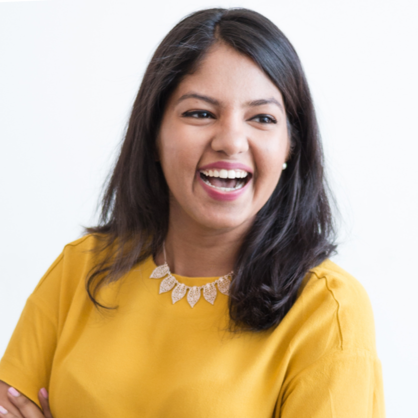 picture of Ananya Huria, in a yellow suit.